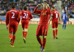 Siêu Suarez lập hattrick, Liverpool hủy diệt Wigan