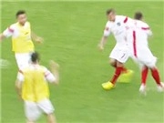 Phil Jones húc ngã Wilshere trên sân tập