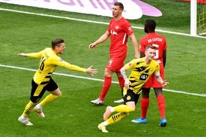 Sancho tỏa sáng trong ngày vắng Haaland, Dortmund bay vào Top 4