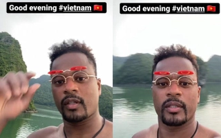 Patrice Evra ăn mừng cuồng nhiệt cùng CĐV Hà Nội sau bàn thắng của MU