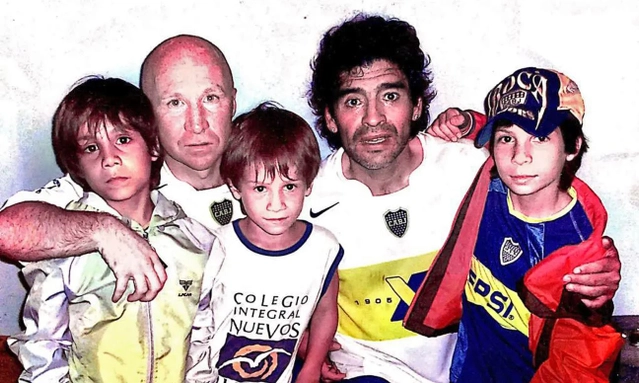Carlos Mac Allister with his sons