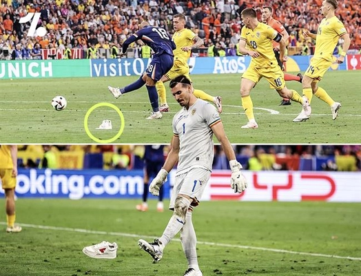 CĐV ném giày về phía thủ môn của Romania  trước khi ĐT Hà Lan ghi bàn thứ ba